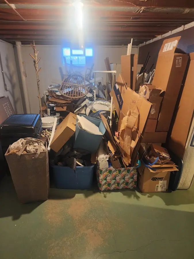 Roll-off dumpster container at job site for Yard Waste Dumpster Rental in Coralville